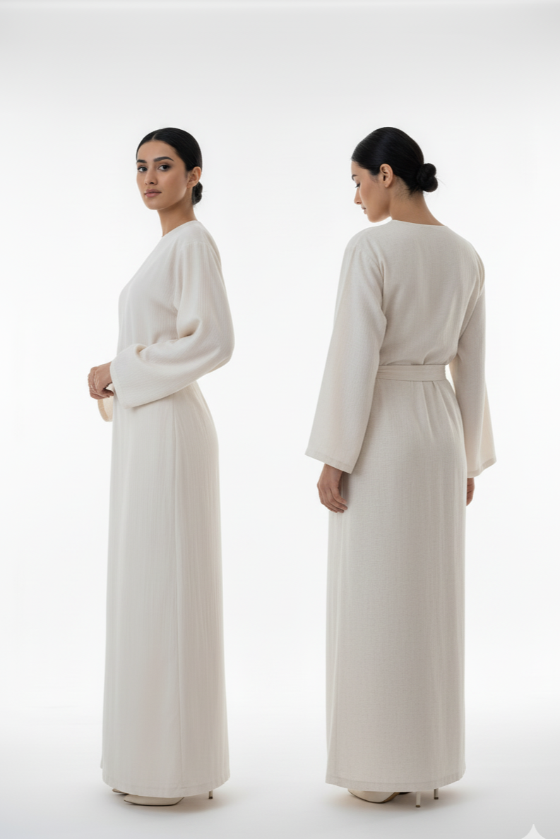 Woman wearing a long, light-colored dress from front and back views on a white background